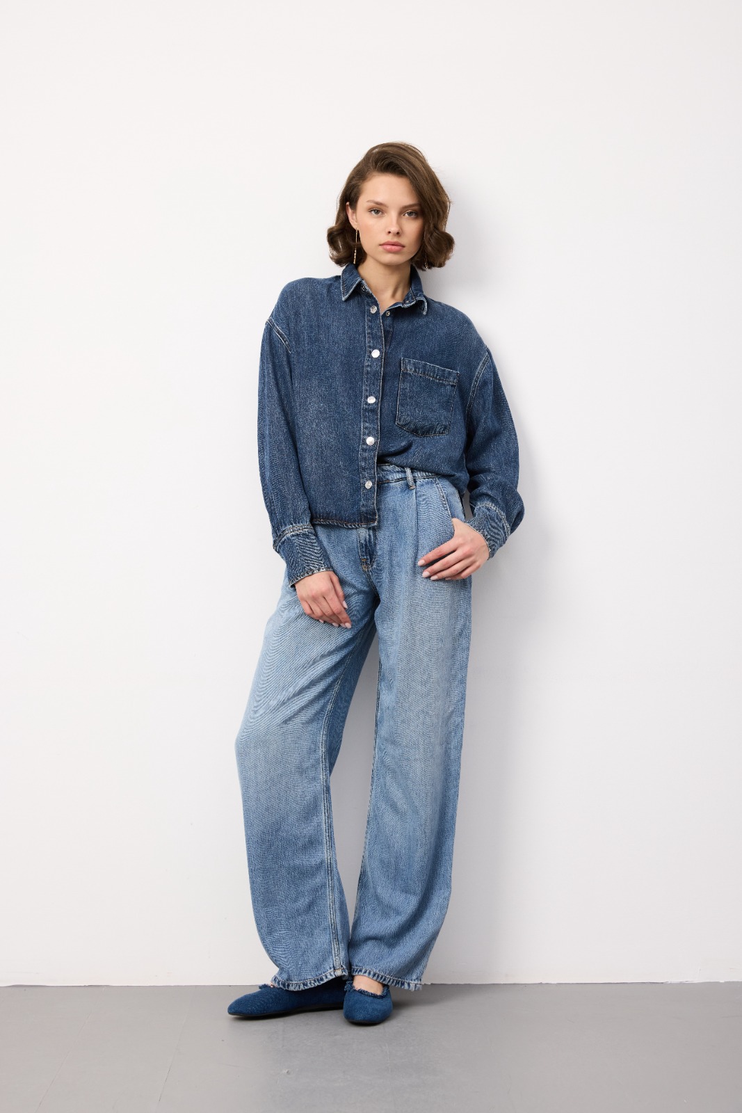 Sample denim garment made from Atlas Denim fabric — model shot 32