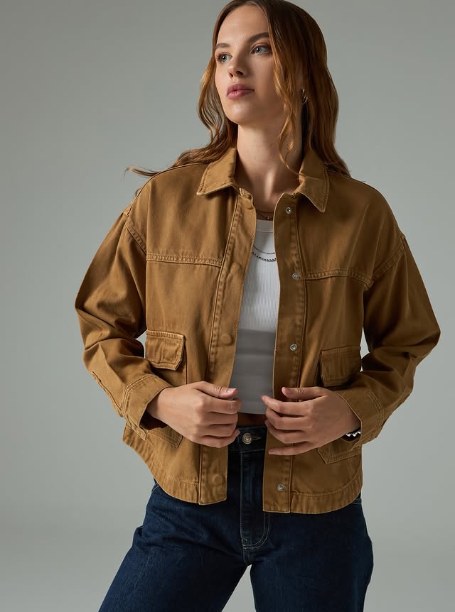 Atlas Denim fabric texture and wash detail — close-up 1