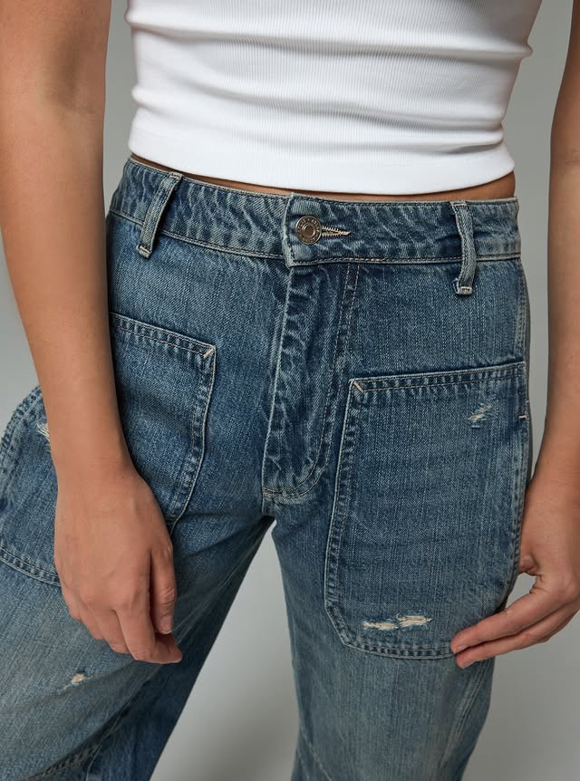 Atlas Denim fabric texture and wash detail — close-up 7